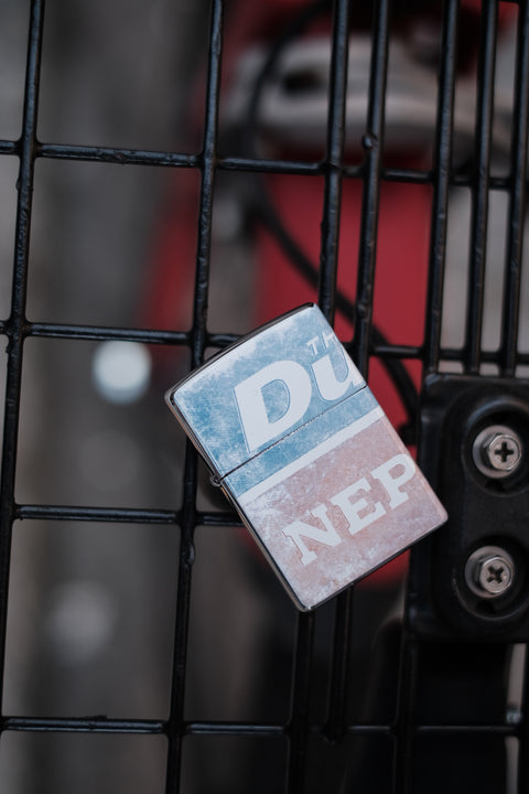 The DUFFER N NEPHEWS/Neill (DNジッポ - used logo)